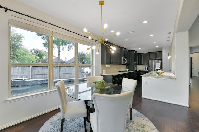 8106 Yarrow Dr, Cypress, TX 77433 - dining area with a chandelier, dark wood finished floors, and recessed lighting