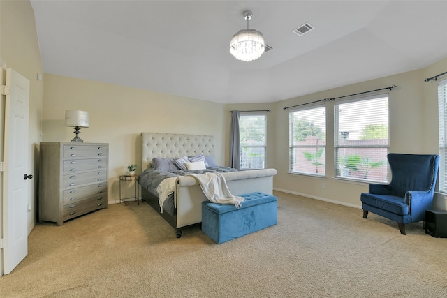 8106 Yarrow Dr, Cypress, TX 77433 - bedroom featuring light colored carpet and a chandelier