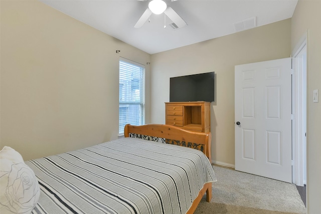 8106 Yarrow Dr, Cypress, TX 77433 - bedroom with light colored carpet and a ceiling fan