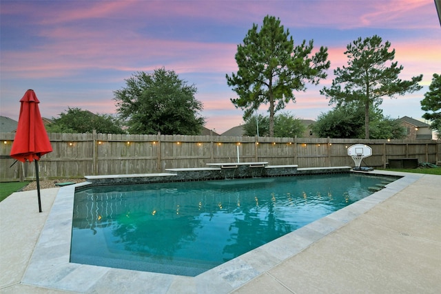 8106 Yarrow Dr, Cypress, TX 77433 - pool at dusk with a fenced backyard