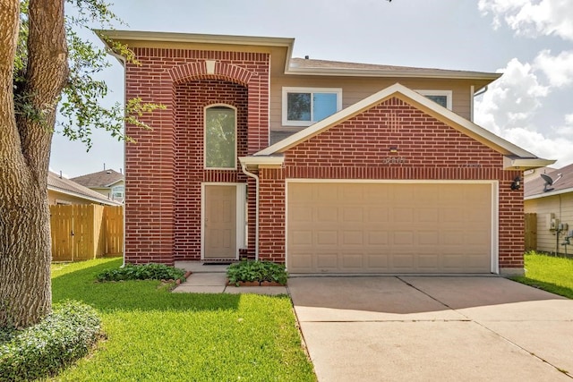 12807 Maybank Shores Ct, Houston, TX 77045 - traditional-style house featuring brick siding, driveway, and a garage
