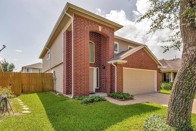 12807 Maybank Shores Ct, Houston, TX 77045 - traditional-style house with brick siding, an attached garage, and driveway