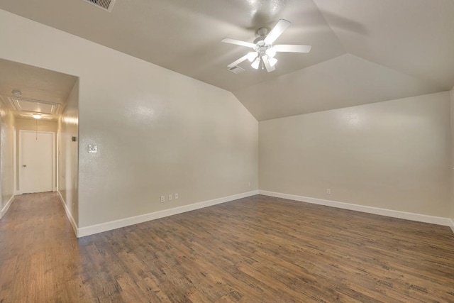 12807 Maybank Shores Ct, Houston, TX 77045 - additional living space featuring attic access, ceiling fan, lofted ceiling, and dark wood finished floors