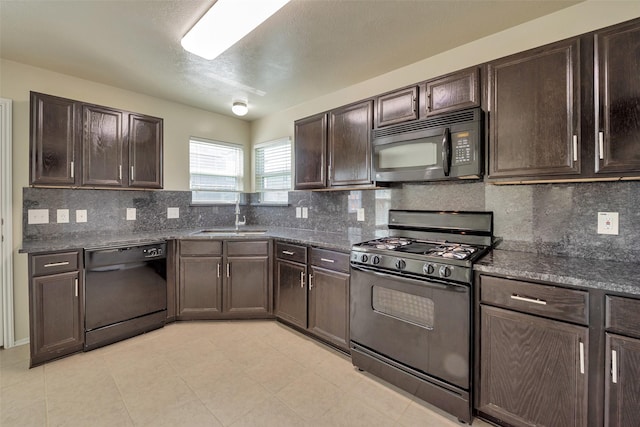 12807 Maybank Shores Ct, Houston, TX 77045 - kitchen featuring black appliances, dark brown cabinetry, and decorative backsplash