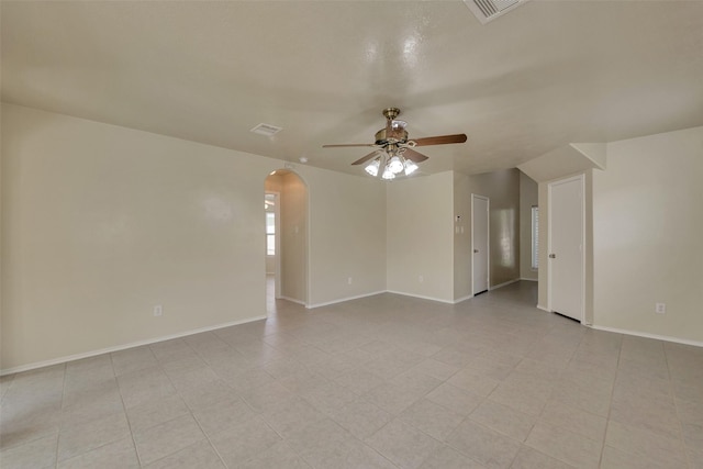 12807 Maybank Shores Ct, Houston, TX 77045 - unfurnished room with arched walkways and a ceiling fan