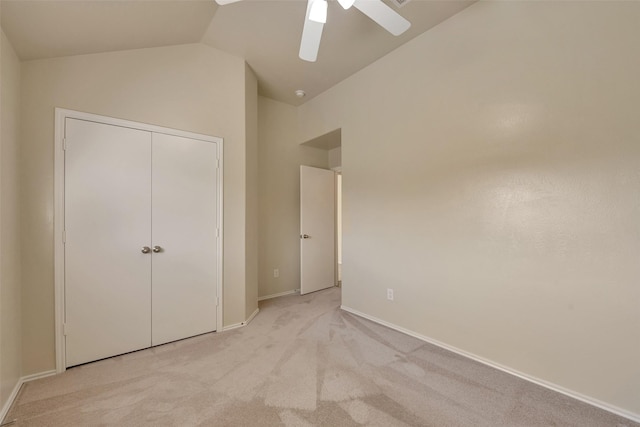 12807 Maybank Shores Ct, Houston, TX 77045 - unfurnished bedroom featuring lofted ceiling, light colored carpet, ceiling fan, and a closet