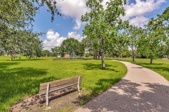 12807 Maybank Shores Ct, Houston, TX 77045 - view of home's community with a lawn