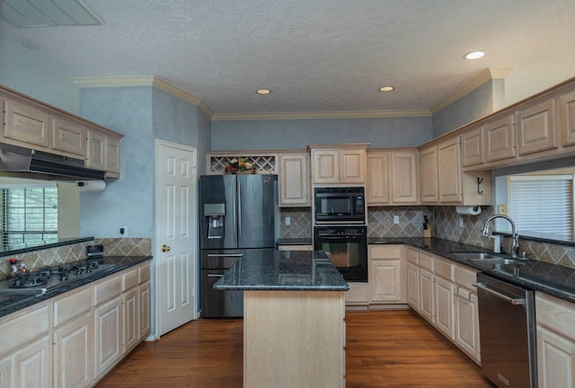 2601 Sailboat Dr, Houston, TX 77058 - kitchen with black appliances, under cabinet range hood, dark wood-style floors, tasteful backsplash, and ornamental molding