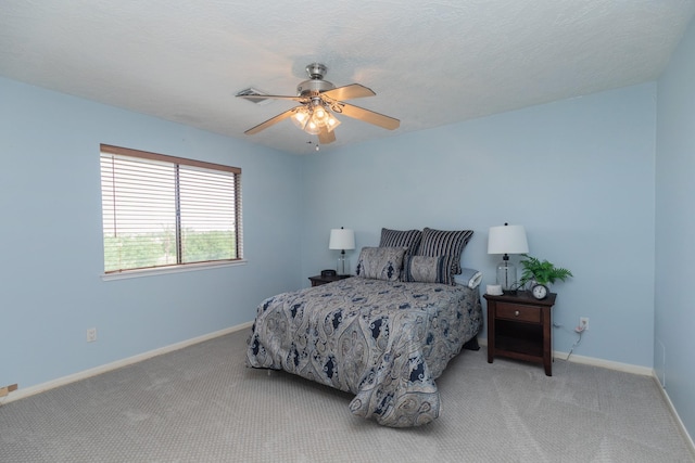 2601 Sailboat Dr, Houston, TX 77058 - carpeted bedroom featuring baseboards and ceiling fan