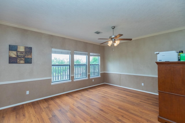 2601 Sailboat Dr, Houston, TX 77058 - unfurnished room featuring wood finished floors, a ceiling fan, and crown molding