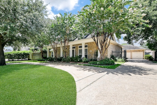 2442 Chimney Rock Rd, Houston, TX 77056 - view of front of home featuring brick siding, a garage, and driveway