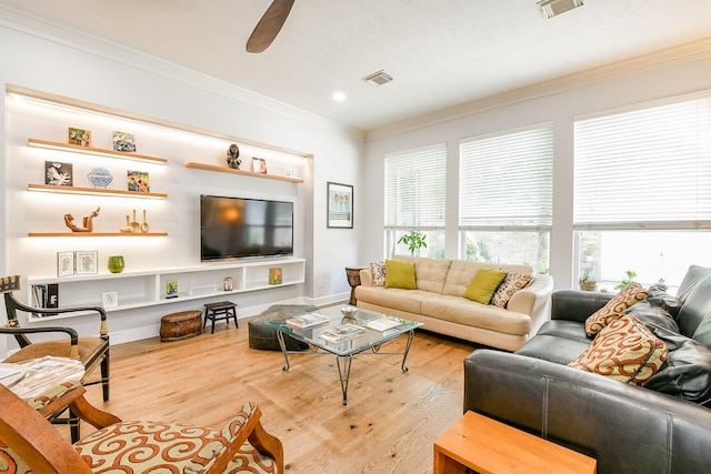 2442 Chimney Rock Rd, Houston, TX 77056 - living area with crown molding, wood finished floors, ceiling fan, and recessed lighting