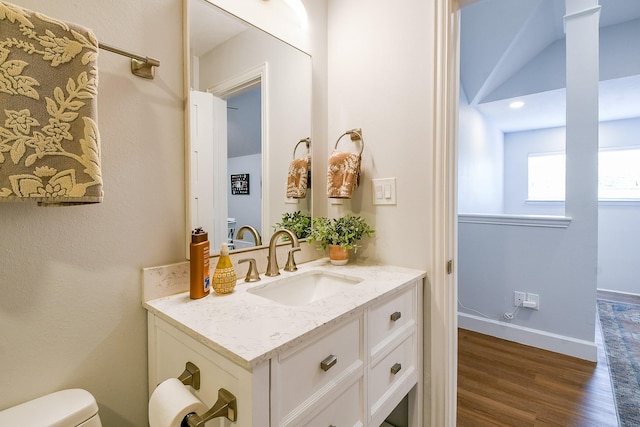 2442 Chimney Rock Rd, Houston, TX 77056 - half bath with vanity and wood finished floors