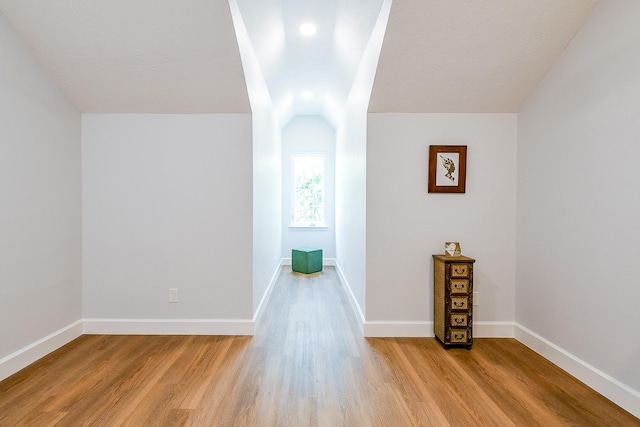 2442 Chimney Rock Rd, Houston, TX 77056 - bonus room featuring light wood-type flooring and lofted ceiling
