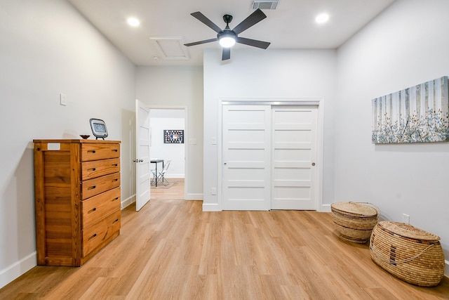 2442 Chimney Rock Rd, Houston, TX 77056 - bedroom with light wood finished floors, a closet, and recessed lighting