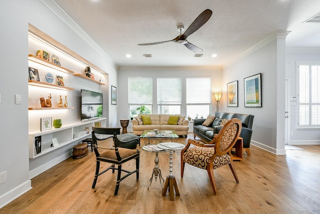 2442 Chimney Rock Rd, Houston, TX 77056 - living room featuring a ceiling fan, light wood-style floors, crown molding, and recessed lighting