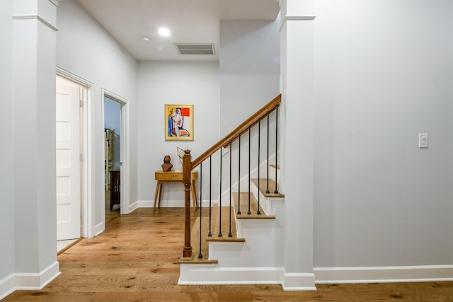 2442 Chimney Rock Rd, Houston, TX 77056 - entrance foyer featuring wood finished floors and stairway