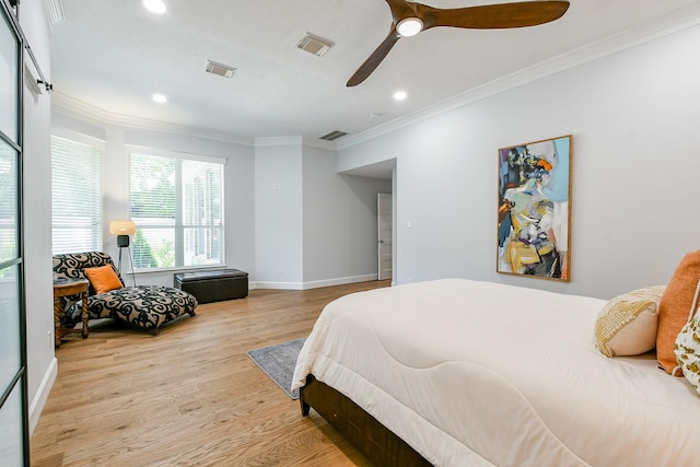 2442 Chimney Rock Rd, Houston, TX 77056 - bedroom featuring crown molding, light wood finished floors, recessed lighting, and a ceiling fan