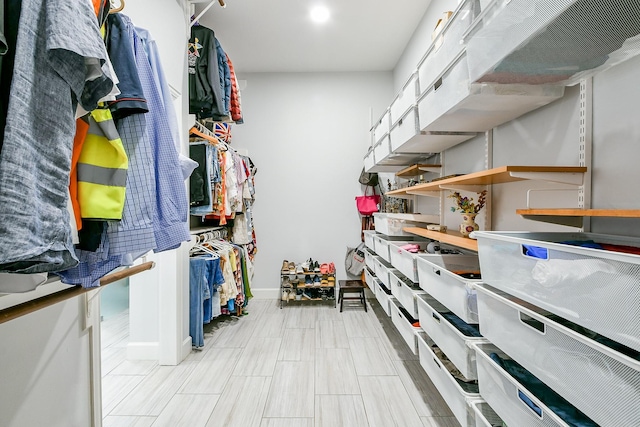 2442 Chimney Rock Rd, Houston, TX 77056 - spacious closet featuring a workshop area