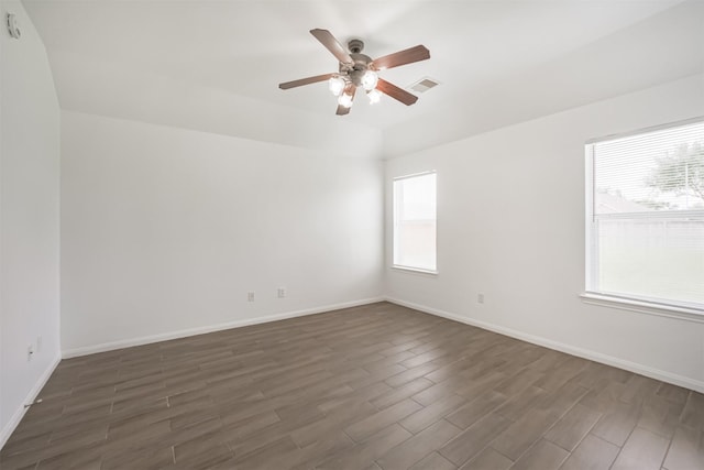 5919 Glenneyre Ln, Houston, TX 77084 - unfurnished room with dark wood-style flooring and ceiling fan