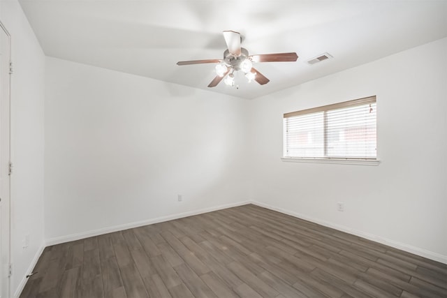 5919 Glenneyre Ln, Houston, TX 77084 - spare room with dark wood-style floors and a ceiling fan