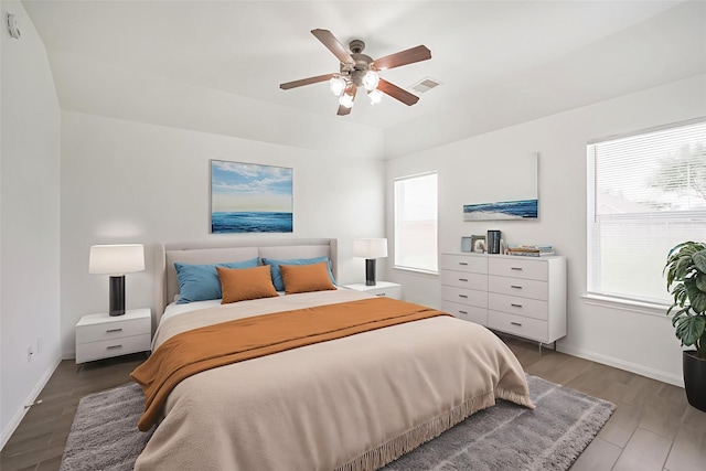 5919 Glenneyre Ln, Houston, TX 77084 - bedroom with a ceiling fan and wood finished floors