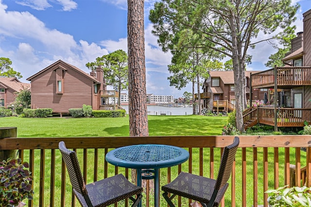 2114 Crows Nest Dr, League City, TX 77573 - wooden terrace featuring a lawn and a water view