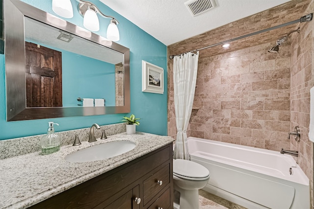 2114 Crows Nest Dr, League City, TX 77573 - bathroom featuring shower / tub combo with curtain, vanity, and a textured ceiling