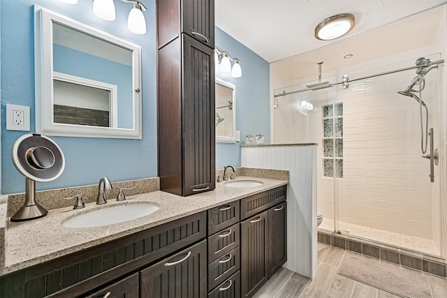 2114 Crows Nest Dr, League City, TX 77573 - bathroom featuring a shower stall and double vanity