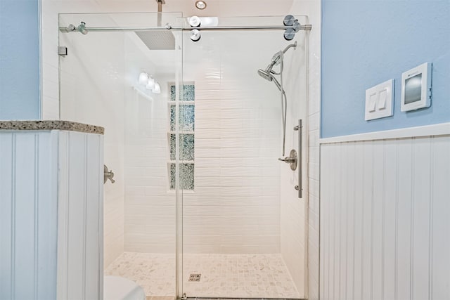 2114 Crows Nest Dr, League City, TX 77573 - full bath featuring a shower stall and a wainscoted wall