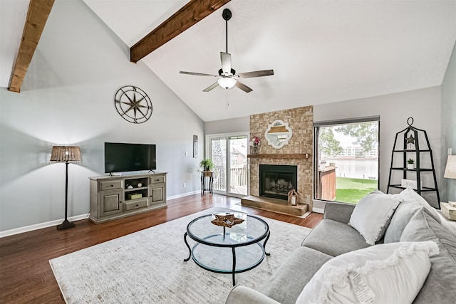 2114 Crows Nest Dr, League City, TX 77573 - living area featuring high vaulted ceiling, a ceiling fan, beamed ceiling, dark wood finished floors, and a large fireplace