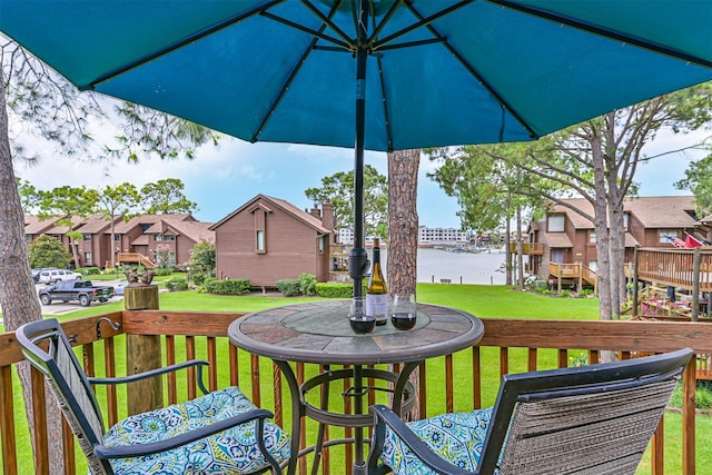 2114 Crows Nest Dr, League City, TX 77573 - wooden deck featuring a water view, a residential view, and a lawn