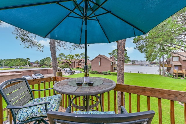2114 Crows Nest Dr, League City, TX 77573 - wooden terrace with a water view, a residential view, and a lawn