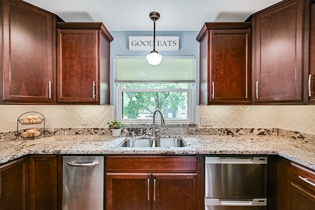 2114 Crows Nest Dr, League City, TX 77573 - kitchen with dishwasher, decorative backsplash, light stone countertops, and decorative light fixtures