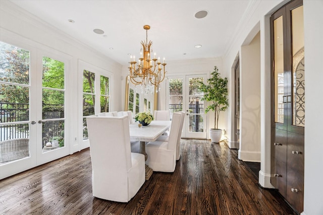 30 Hackberry Ln Unit A, Houston, TX 77027 - dining area with french doors, dark wood-style floors, a chandelier, and crown molding