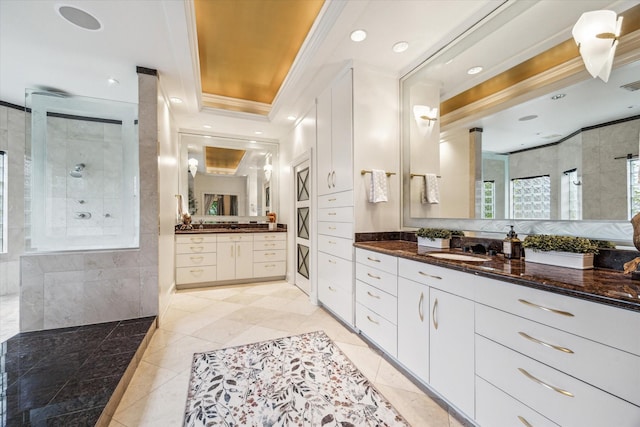 30 Hackberry Ln Unit A, Houston, TX 77027 - bathroom featuring crown molding, a walk in shower, two vanities, and tile patterned floors