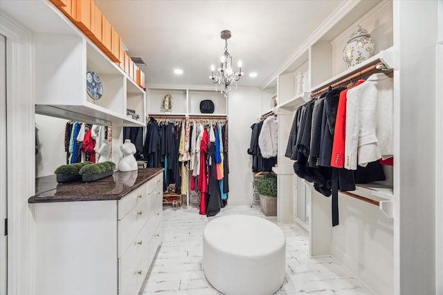 30 Hackberry Ln Unit A, Houston, TX 77027 - spacious closet featuring a chandelier