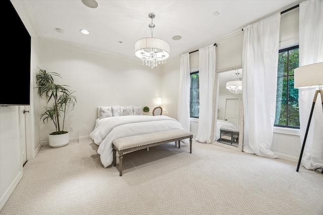 30 Hackberry Ln Unit A, Houston, TX 77027 - carpeted bedroom featuring a chandelier and ornamental molding