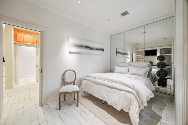 30 Hackberry Ln Unit A, Houston, TX 77027 - bedroom with crown molding and baseboards