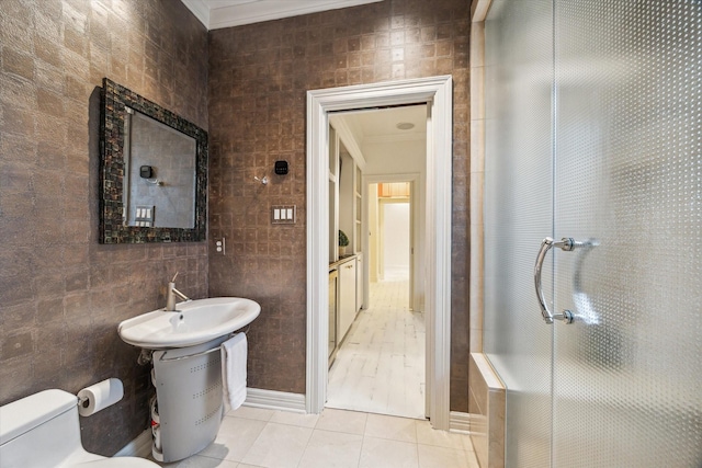 30 Hackberry Ln Unit A, Houston, TX 77027 - bathroom featuring crown molding, tile walls, tile patterned flooring, and a shower stall