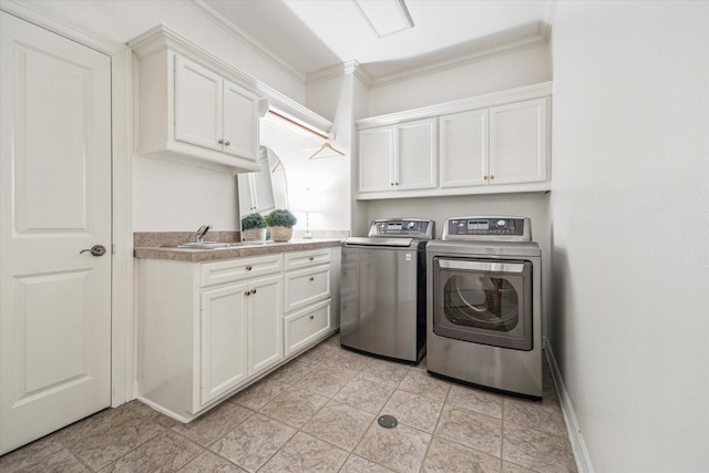 30 Hackberry Ln Unit A, Houston, TX 77027 - laundry room with washer and clothes dryer, cabinet space, and crown molding