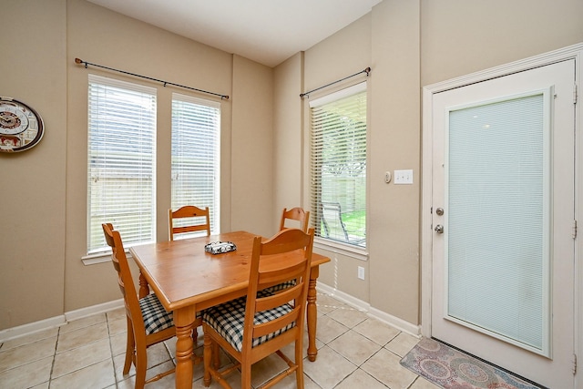 21211 Dover Park Ln, Katy, TX 77450 - dining room featuring light tile patterned floors and baseboards