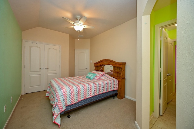 21211 Dover Park Ln, Katy, TX 77450 - bedroom with a closet, light carpet, vaulted ceiling, and a ceiling fan
