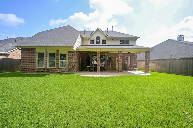 21211 Dover Park Ln, Katy, TX 77450 - back of property with a patio, a fenced backyard, and brick siding