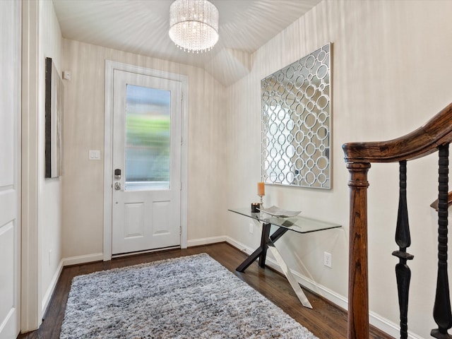 249 E 27th St, Houston, TX 77008 - entrance foyer with a chandelier and dark wood-style floors