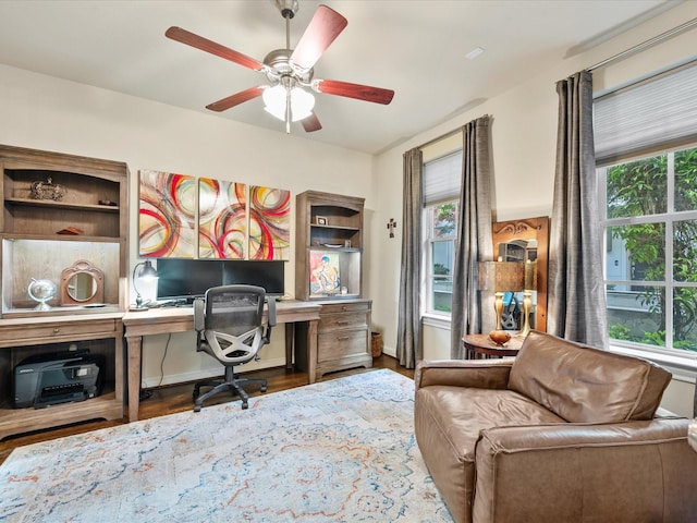 249 E 27th St, Houston, TX 77008 - office with healthy amount of natural light, a ceiling fan, wood finished floors, and built in study area