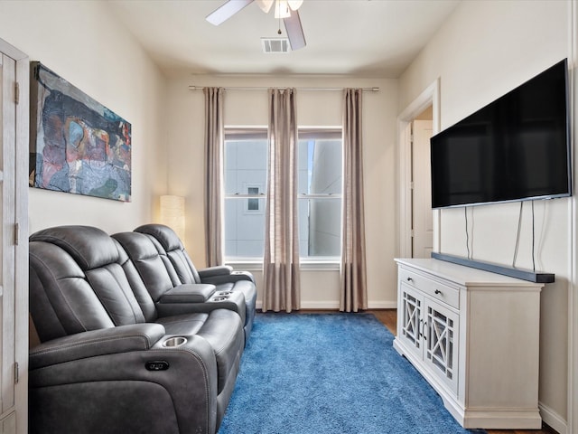 249 E 27th St, Houston, TX 77008 - carpeted living area featuring ceiling fan and baseboards