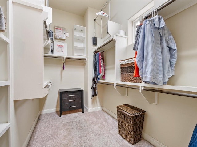 249 E 27th St, Houston, TX 77008 - walk in closet with carpet flooring