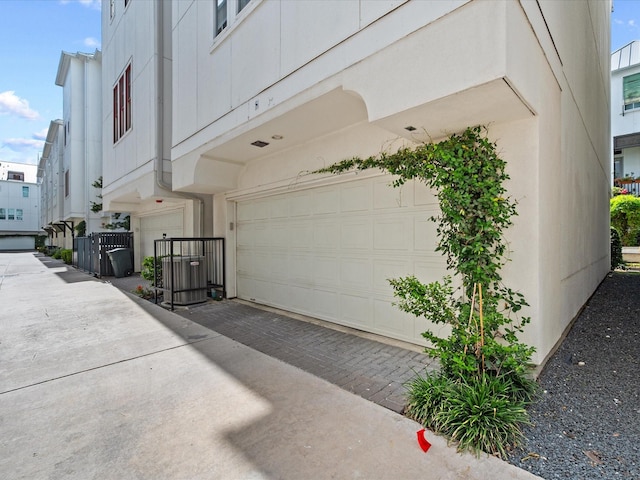 249 E 27th St, Houston, TX 77008 - garage featuring driveway