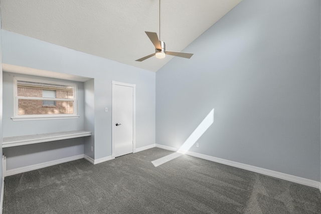 2919 Lake View Dr, Missouri City, TX 77459 - unfurnished bedroom featuring dark colored carpet, vaulted ceiling, and ceiling fan